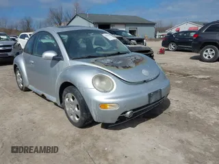 2003 Volkswagen New Beetle Coupe GLS with VIN 3VWCK21C53M433727, listed as a IAAI auction lot 41889585 with 214,144 mi miles. Bid and sale history available at carsss.com. Image 1.