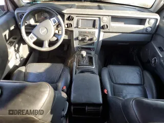 2010 Jeep Commander Sport с VIN 1J4RG4GK0AC124393, выставлен на аукционе Copart как лот 51321935 с пробегом Не указан миль и На запчасти • Non repairable. История ставок и продаж доступна на DreamBid. Изображение 8.