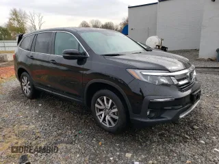 2022 Honda Pilot EX-L with VIN 5FNYF6H55NB035484, listed as a Copart auction lot 80648114 with 50,636 mi miles and Salvage Title. Bid and sale history available at carsss.com. Image 4.