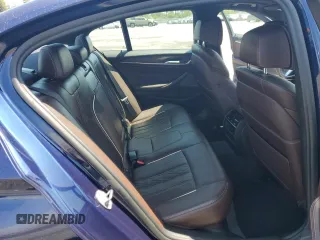 2018 BMW 5 Series 540i with VIN WBAJE5C51JWA94673, listed as a Copart auction lot 59807825 with 77,051 mi miles and Salvage title. Bid and sale history available at DreamBid. Image 10.