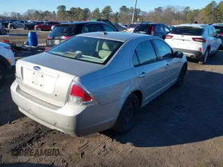 2008 Ford Fusion S with VIN 3FAHP06ZX8R181470, listed as a IAAI auction lot 41573211 with 249,337 mi miles. Bid and sale history available at carsss.com. Image 4.