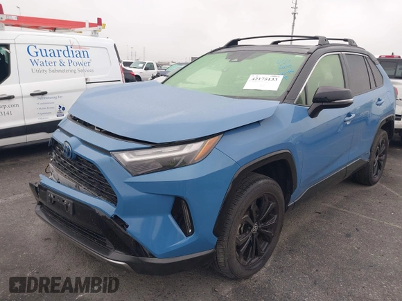 2022 Toyota RAV4 Hybrid XSE with VIN JTME6RFV7ND530526, listed as a IAAI auction lot 42175133 with 70,353 mi miles and . Bid and sale history available at DreamBid. Image 2.