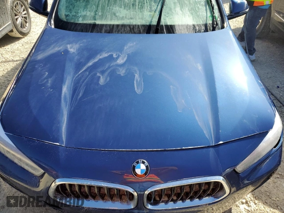 2021 BMW X2 sDrive28i with VIN WBXYH9C02M5S54591, listed as a Copart auction lot 77223834 with 0 mi miles and Salvage Title. Bid and sale history available at carsss.com. Image 11.