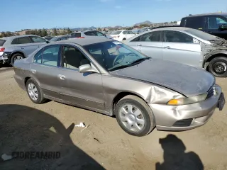 2002 Mitsubishi Galant ES z VIN 4A3AA46G12E123287, wystawiony jako Copart lot #74540784 z przebiegiem 259 181 mil mil oraz Szkoda całkowita • Salvage title. Historia ofert i sprzedaży dostępna na DreamBid. Obrazek 4.