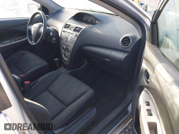 2009 Toyota Yaris with VIN JTDBT903194041550, listed as a IAAI auction lot 41993832 with 214,544 mi miles. Bid and sale history available at carsss.com. Image 5.