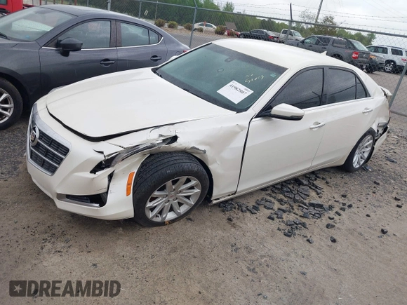 2014 Cadillac CTS Sedan RWD with VIN 1G6AP5SXXE0178113, listed as a IAAI auction lot 41982807 with 111,734 mi miles. Bid and sale history available at carsss.com. Image 2.