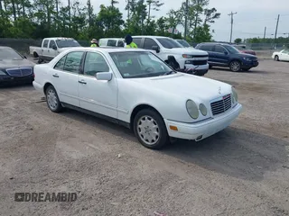 1998 Mercedes-Benz E-Class with VIN WDBJF65FXWA615255, listed as a IAAI auction lot 42146962 with 219,710 mi miles. Bid and sale history available at carsss.com. Image 1.