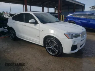 2015 BMW X4 xDrive35i with VIN 5UXXW5C51F0E87978, listed as a Copart auction lot 77793773 with 96,152 mi miles. Bid and sale history available at carsss.com. Image 4.