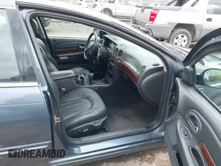 2002 Chrysler 300M with VIN 2C3HE66G02H272675, listed as a IAAI auction lot 41506232 with 165,187 mi miles. Bid and sale history available at carsss.com. Image 5.