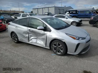 2021 Toyota Prius L Eco with VIN JTDKAMFU6M3141280, listed as a Copart auction lot 47604825 with 65,725 mi miles and Salvage Title. Bid and sale history available at carsss.com. Image 4.