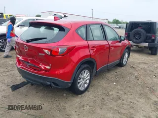 2015 Mazda CX-5 Sport with VIN JM3KE2BE5F0484326, listed as a IAAI auction lot 42186263 with 192,118 mi miles and . Bid and sale history available at DreamBid. Image 4.