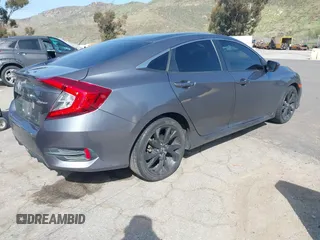 2019 Honda Civic Sedan Sport with VIN 2HGFC2F8XKH557203, listed as a IAAI auction lot 41846429 with 105,598 mi miles. Bid and sale history available at carsss.com. Image 4.