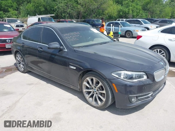 2014 BMW 5 Series 535i with VIN WBA5B1C51ED475795, listed as a IAAI auction lot 42028184 with 119,692 mi miles. Bid and sale history available at carsss.com. Image 1.
