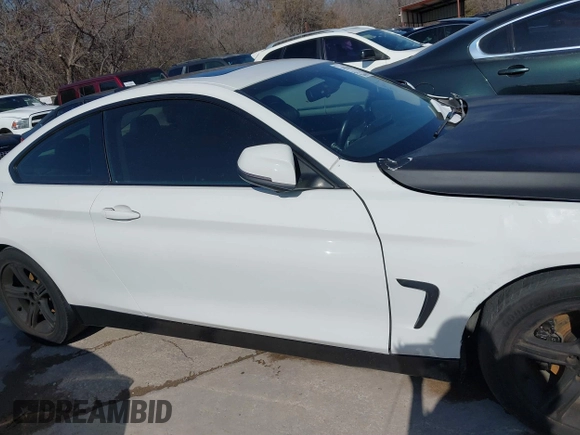 2014 BMW 4 Series 428i xDrive z VIN WBA3N9C50EF722242, wystawiony jako IAAI lot #41526322 z przebiegiem 134 254 mil mil oraz . Historia ofert i sprzedaży dostępna na DreamBid. Obrazek 13.