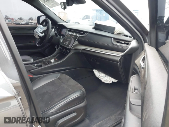 2023 Jeep Grand Cherokee Altitude with VIN 1C4RJJAG1P8902402, listed as a IAAI auction lot 42584202 with 13,913 mi miles and . Bid and sale history available at DreamBid. Image 5.