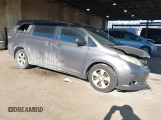 2011 Toyota Sienna with VIN 5TDZK3DC0BS075319, listed as a IAAI auction lot 41458855 with 211,583 mi miles. Bid and sale history available at carsss.com. Image 1.