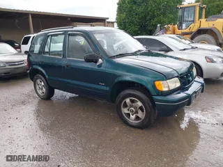 2000 Kia Sportage with VIN KNDJA7233Y5685000, listed as a IAAI auction lot 42005169 with 221,447 mi miles. Bid and sale history available at carsss.com. Image 1.