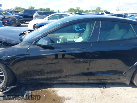 2022 Tesla Model S Plaid with VIN 5YJSA1E63NF478351, listed as a IAAI auction lot 42056199 with Not provided miles and . Bid and sale history available at DreamBid. Image 13.