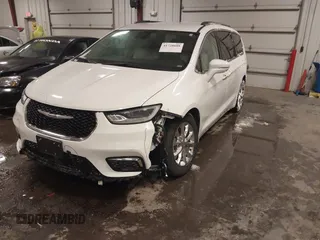 2021 Chrysler Pacifica Touring L with VIN 2C4RC1BG3MR504293, listed as a IAAI auction lot 41728608 with 70,487 mi miles and . Bid and sale history available at DreamBid. Image 17.