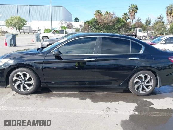 2016 Honda Accord Sedan EX with VIN 1HGCR2F71GA223298, listed as a IAAI auction lot 41976282 with 121,117 mi miles. Bid and sale history available at carsss.com. Image 14.