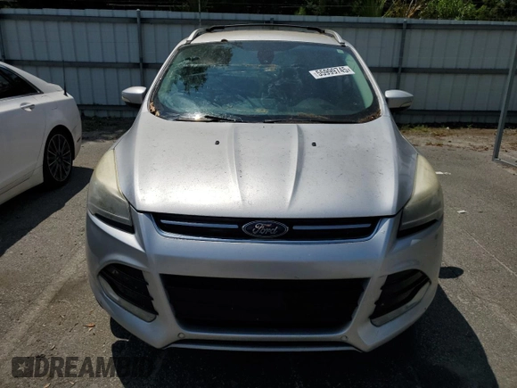2013 Ford Escape Titanium z VIN 1FMCU0J96DUB50607, wystawiony jako Copart lot #55999745 z przebiegiem 177 798 mil mil oraz Czysty tytuł • Clean title. Historia ofert i sprzedaży dostępna na DreamBid. Obrazek 5.