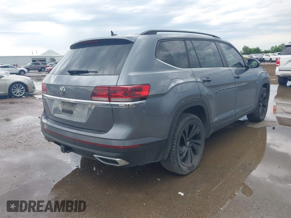 2022 Volkswagen Atlas SE z VIN 1V2JR2CA4NC529787, wystawiony jako IAAI lot #42051211 z przebiegiem 55 787 mil mil oraz . Historia ofert i sprzedaży dostępna na DreamBid. Obrazek 4.