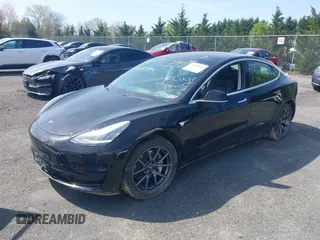 2019 Tesla Model 3 Mid Range with VIN 5YJ3E1EA0KF394514, listed as a IAAI auction lot 42080985 with Not Provided miles and . Bid and sale history available at DreamBid. Image 2.