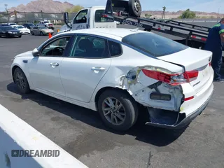 2019 Kia Optima LX with VIN 5XXGT4L30KG335926, listed as a IAAI auction lot 41986835 with 114,309 mi miles. Bid and sale history available at carsss.com. Image 3.
