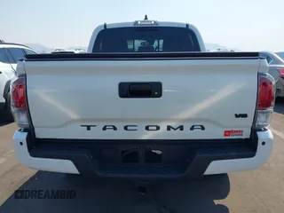 2023 Toyota Tacoma SR with VIN 3TMCZ5AN7PM630874, listed as a IAAI auction lot 40298041 with 8,635 mi miles and . Bid and sale history available at DreamBid. Image 16.