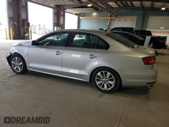 2015 Volkswagen Jetta SE with VIN 3VWD07AJ4FM404097, listed as a Copart auction lot 55054165 with 107,803 mi miles and Salvage title. Bid and sale history available at DreamBid. Image 2.