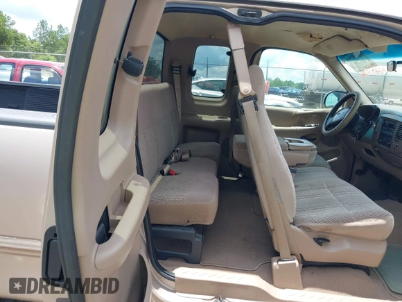 1998 Ford F-150 with VIN 1FTZX1760WNB21027, listed as a IAAI auction lot 42651506 with 189,442 mi miles and . Bid and sale history available at DreamBid. Image 8.