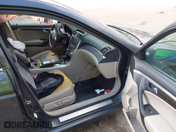 2007 Acura TL with VIN 19UUA66287A023249, listed as a IAAI auction lot 42091228 with 242,269 mi miles. Bid and sale history available at carsss.com. Image 5.
