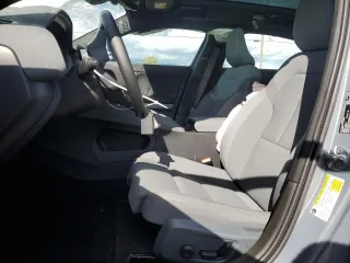 2023 Polestar 2 z VIN YSMEG3KA1PL128835, wystawiony jako Copart lot #57101535 z przebiegiem 66 123 mil mil oraz Tytuł czysty. Historia ofert i sprzedaży dostępna na DreamBid. Obrazek 7.