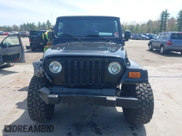 2005 Jeep Wrangler X z VIN 1J4FA39S45P382880, wystawiony jako IAAI lot #42129610 z przebiegiem 191 864 mil mil oraz . Historia ofert i sprzedaży dostępna na DreamBid. Obrazek 12.