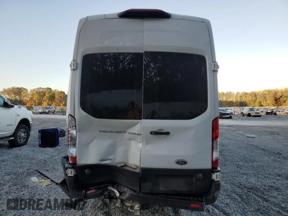2020 Ford Transit Cargo with VIN 1FTBF4XG3LKB70573, listed as a Copart auction lot 77039474 with 131,873 mi miles and Salvage Title. Bid and sale history available at DreamBid. Image 6.