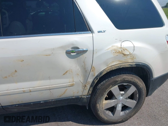 2012 GMC Acadia SLT1 z VIN 1GKKRRED0CJ406684, wystawiony jako IAAI lot #39995301 z przebiegiem 175 333 mil mil oraz . Historia ofert i sprzedaży dostępna na DreamBid. Obrazek 15.