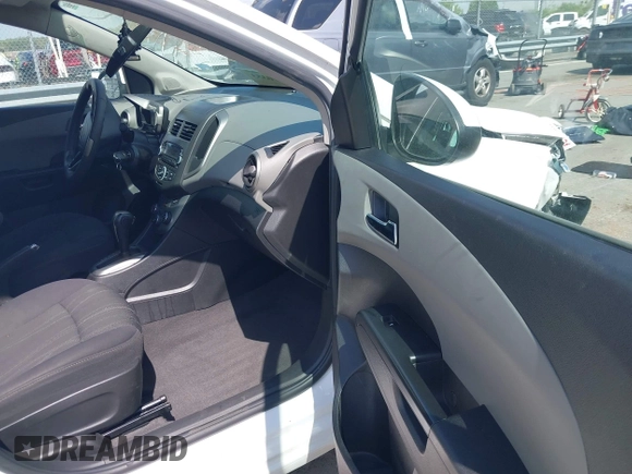 2014 Chevrolet Sonic LT with VIN 1G1JC5SH0E4232070, listed as a IAAI auction lot 41970353 with 140,557 mi miles and . Bid and sale history available at DreamBid. Image 5.