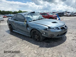 2005 Pontiac GTO z VIN 6G2VX12UX5L352121, wystawiony jako Copart lot #56840425 z przebiegiem 42 265 mil mil oraz Szkody całkowita. Historia ofert i sprzedaży dostępna na DreamBid. Obrazek 4.