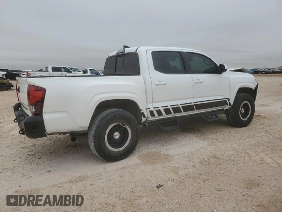 2018 Toyota Tacoma SR with VIN 3TMCZ5AN4JM143350, listed as a Copart auction lot 83234524 with 70,853 mi miles and Clean Title. Bid and sale history available at DreamBid. Image 3.