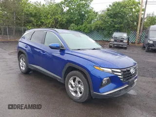 2022 Hyundai Tucson SEL z VIN 5NMJBCAE1NH026298, wystawiony jako IAAI lot #42365533 z przebiegiem 44 080 mil mil oraz . Historia ofert i sprzedaży dostępna na DreamBid. Obrazek 1.