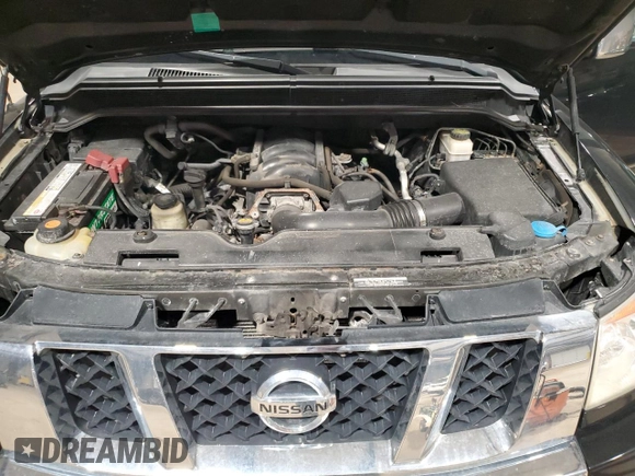 2013 Nissan Titan Pro-4X с VIN 1N6AA0EC1DN301354, выставлен на аукционе Copart как лот 45233045 с пробегом 172 450 миль миль и Списание • Salvage title. История ставок и продаж доступна на DreamBid. Изображение 11.