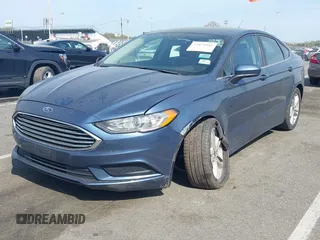 2018 Ford Fusion SE z VIN 3FA6P0H74JR176113, wystawiony jako IAAI lot #42074916 z przebiegiem 78 940 mil mil oraz . Historia ofert i sprzedaży dostępna na DreamBid. Obrazek 17.