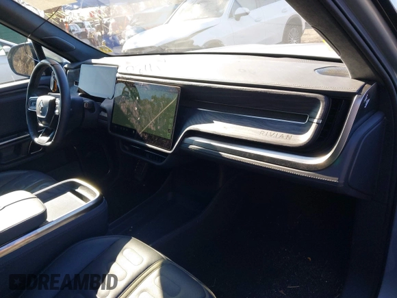 2022 Rivian R1T Adventure Package with VIN 7FCTGAAA1NN012328, listed as a IAAI auction lot 41307929 with 13,588 mi miles. Bid and sale history available at carsss.com. Image 5.