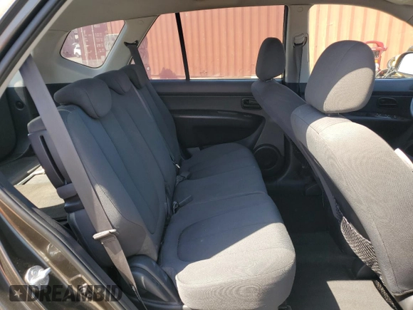 2010 Kia Rondo LX with VIN KNAHG8C84A7299898, listed as a Copart auction lot 53477175 with 127,990 mi miles and Salvage Title. Bid and sale history available at carsss.com. Image 11.