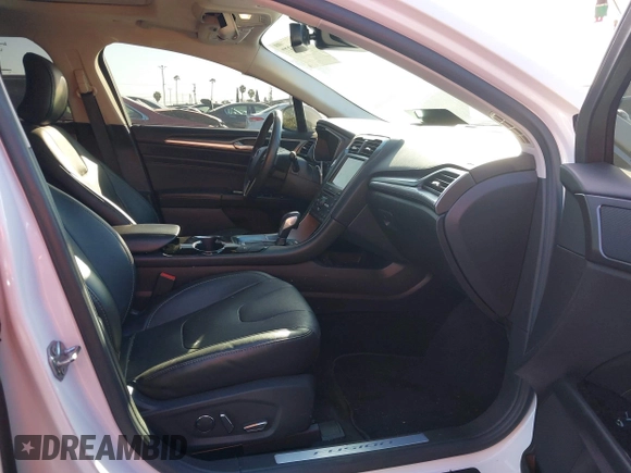 2016 Ford Fusion Titanium Hybrid with VIN 3FA6P0RU1GR259947, listed as a IAAI auction lot 41695377 with 97,605 mi miles. Bid and sale history available at carsss.com. Image 5.