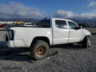 2023 Toyota Tacoma 4WD SR with VIN 3TMCZ5AN6PM644930, listed as a Copart auction lot 42878095 with 12,882 mi miles and Salvage Title. Bid and sale history available at carsss.com. Image 3.
