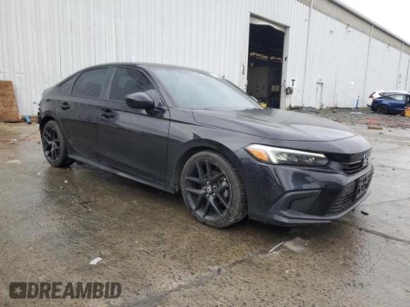 2023 Honda Civic Sport with VIN 2HGFE2F52PH548082, listed as a Copart auction lot 57226055 with 33,155 mi miles and Salvage title. Bid and sale history available at DreamBid. Image 4.