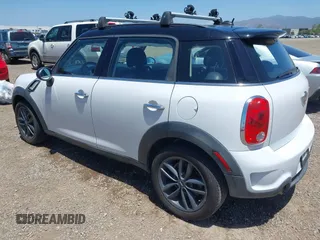 2014 MINI Countryman S z VIN WMWZC3C56EWP52407, wystawiony jako IAAI lot #42255716 z przebiegiem 74 943 mil mil oraz . Historia ofert i sprzedaży dostępna na DreamBid. Obrazek 3.