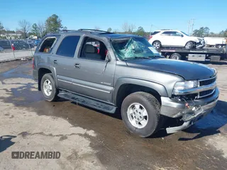 2002 Chevrolet Tahoe LT with VIN 1GNEK13Z02J312078, listed as a IAAI auction lot 41825762 with 245,655 mi miles. Bid and sale history available at carsss.com. Image 1.