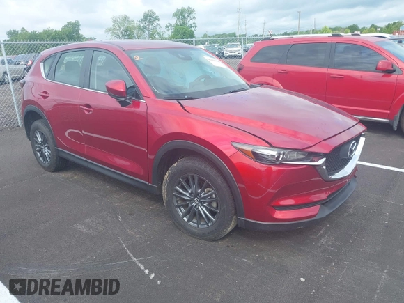 2019 Mazda CX-5 Sport with VIN JM3KFABM5K0627087, listed as a IAAI auction lot 42163866 with 38,050 mi miles and . Bid and sale history available at DreamBid. Image 1.